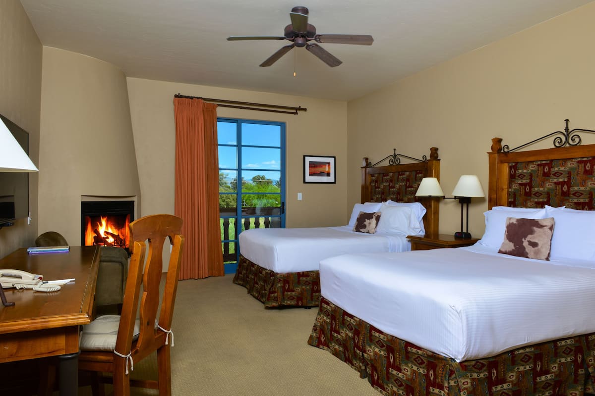 Deluxe Room, 2 Queen Beds, Fireplace | Premium bedding, memory foam beds, in-room safe, desk