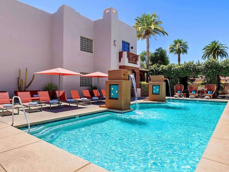 Outdoor pool, a heated pool, open 7:00 AM to 10:00 PM, pool umbrellas