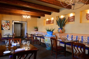 Enjoy a formal dining experience with elegant ambiance and artistic flair.