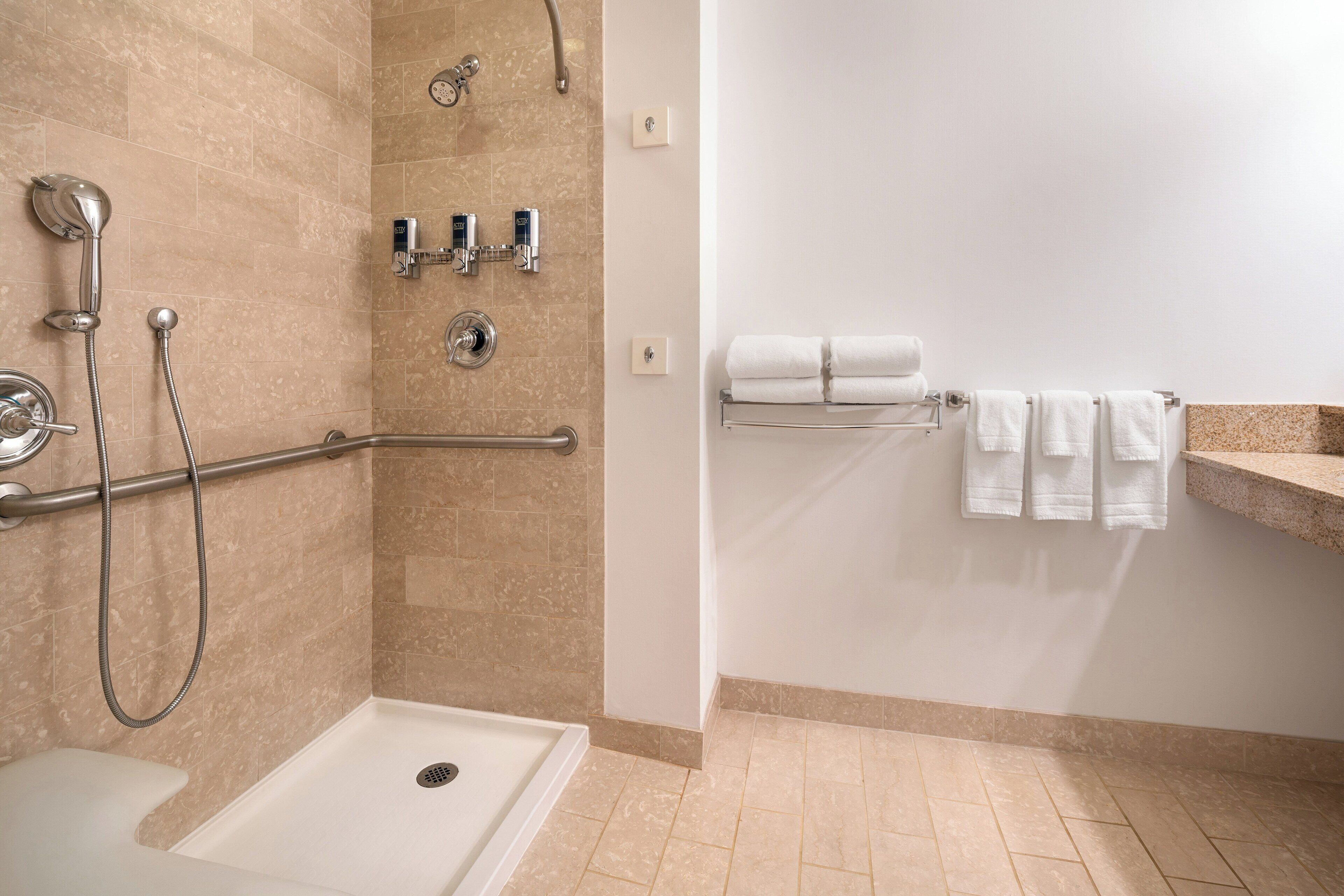 shower, free toiletries, hair dryer, towels