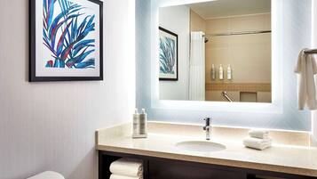 Combined shower/tub, designer toiletries, hair dryer, towels