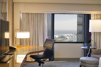 Hotel amenities such as safe, desk and work area at Swissotel - Chicago