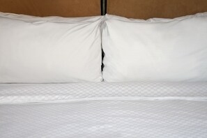 Premium bedding, pillow-top beds, in-room safe, desk