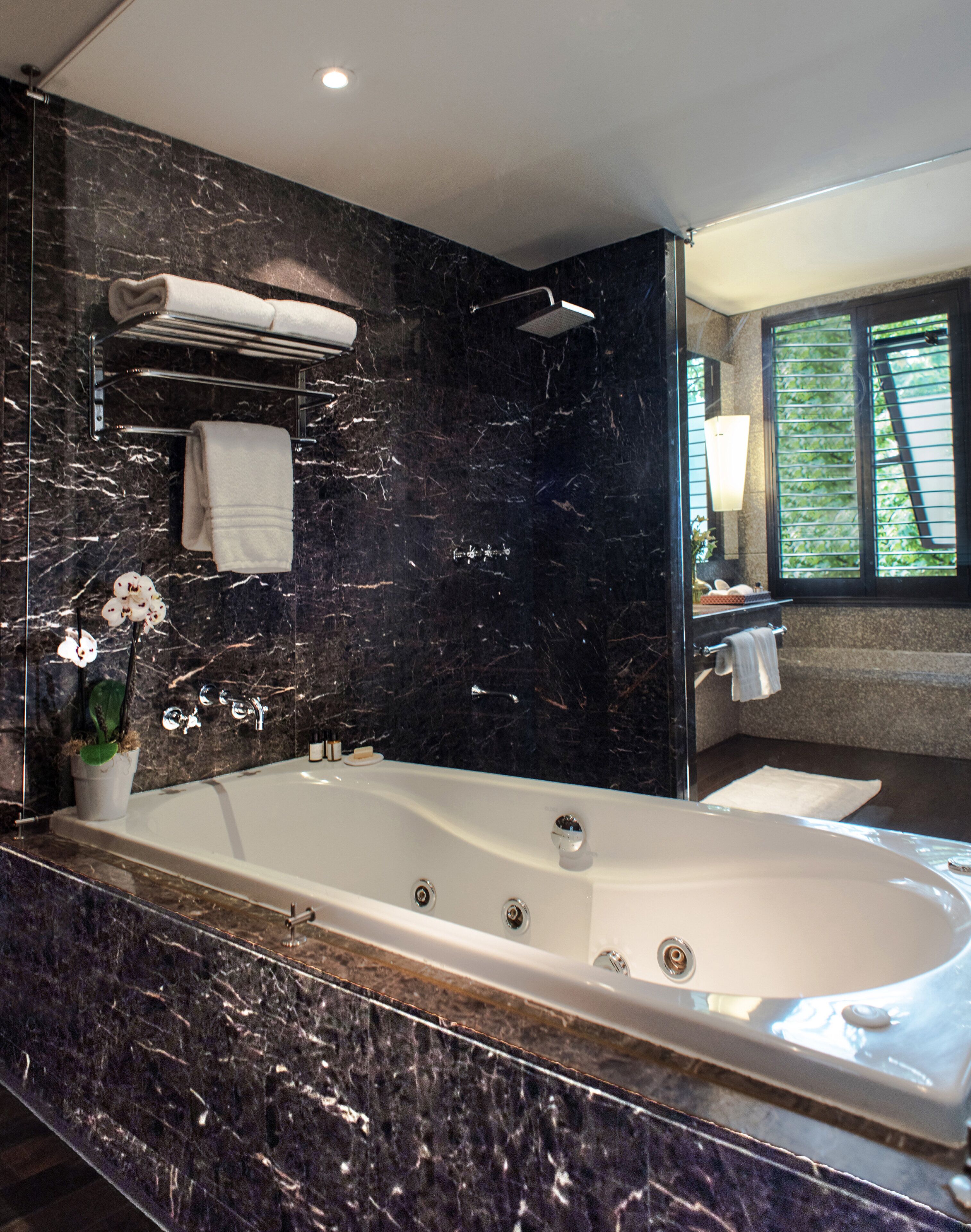 colonial one-bedroom suite | bathroom | shower, designer toiletries, hair dryer, bathrobes