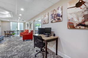 A modern office space with a desk, computer, and seating area. - Best Western Lumberton (Lumberton)