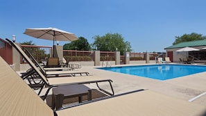 Outdoor pool, pool umbrellas, pool loungers