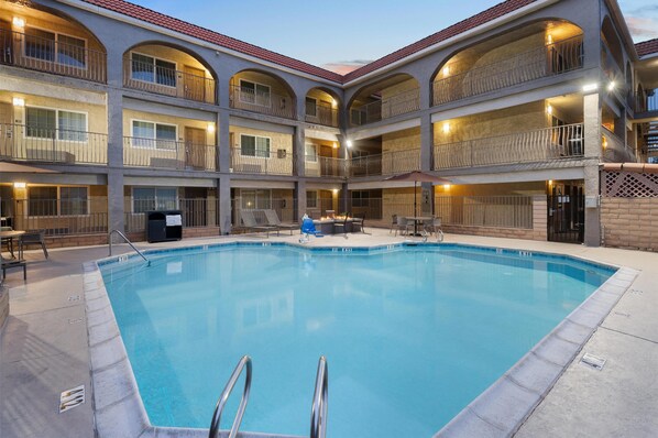 Outdoor pool, pool umbrellas, pool loungers