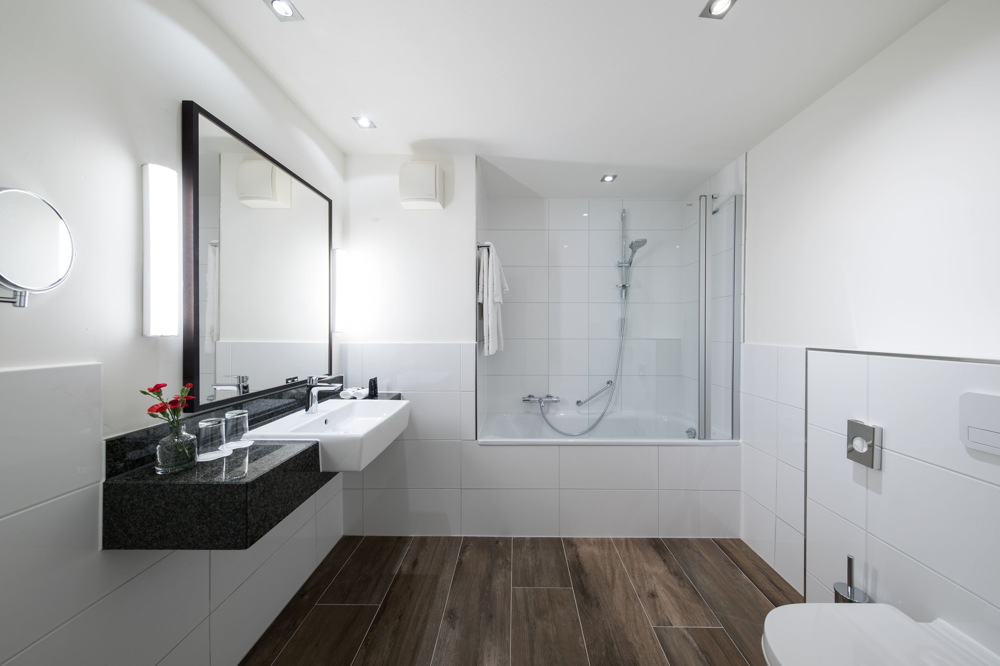 standard double room | bathroom | shower, eco-friendly toiletries, hair dryer, towels