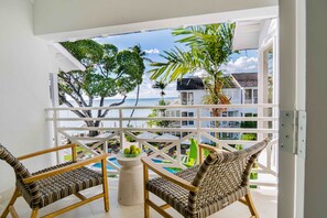 Premium bedding, down comforters, in-room safe, laptop workspace - Treasure Beach Art Hotel, Barbados, An Autograph Collection All-Inclusive Resort (Paynes Bay)