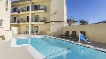 Outdoor pool, open 8:00 AM to 10:00 PM, sun loungers