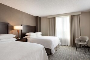 Suite, 2 Queen Beds, Non Smoking, Corner | In-room safe, desk, laptop workspace, blackout drapes