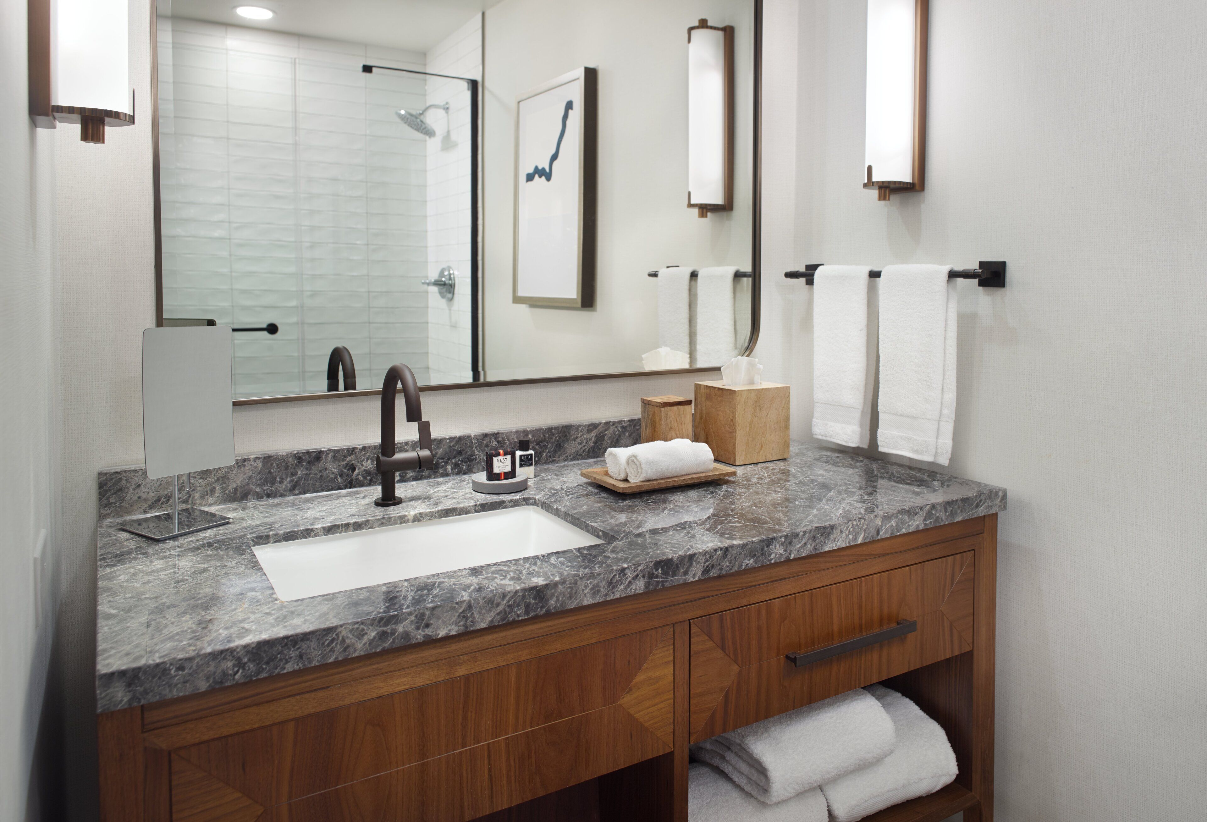 combined shower/bathtub, rainfall showerhead, designer toiletries