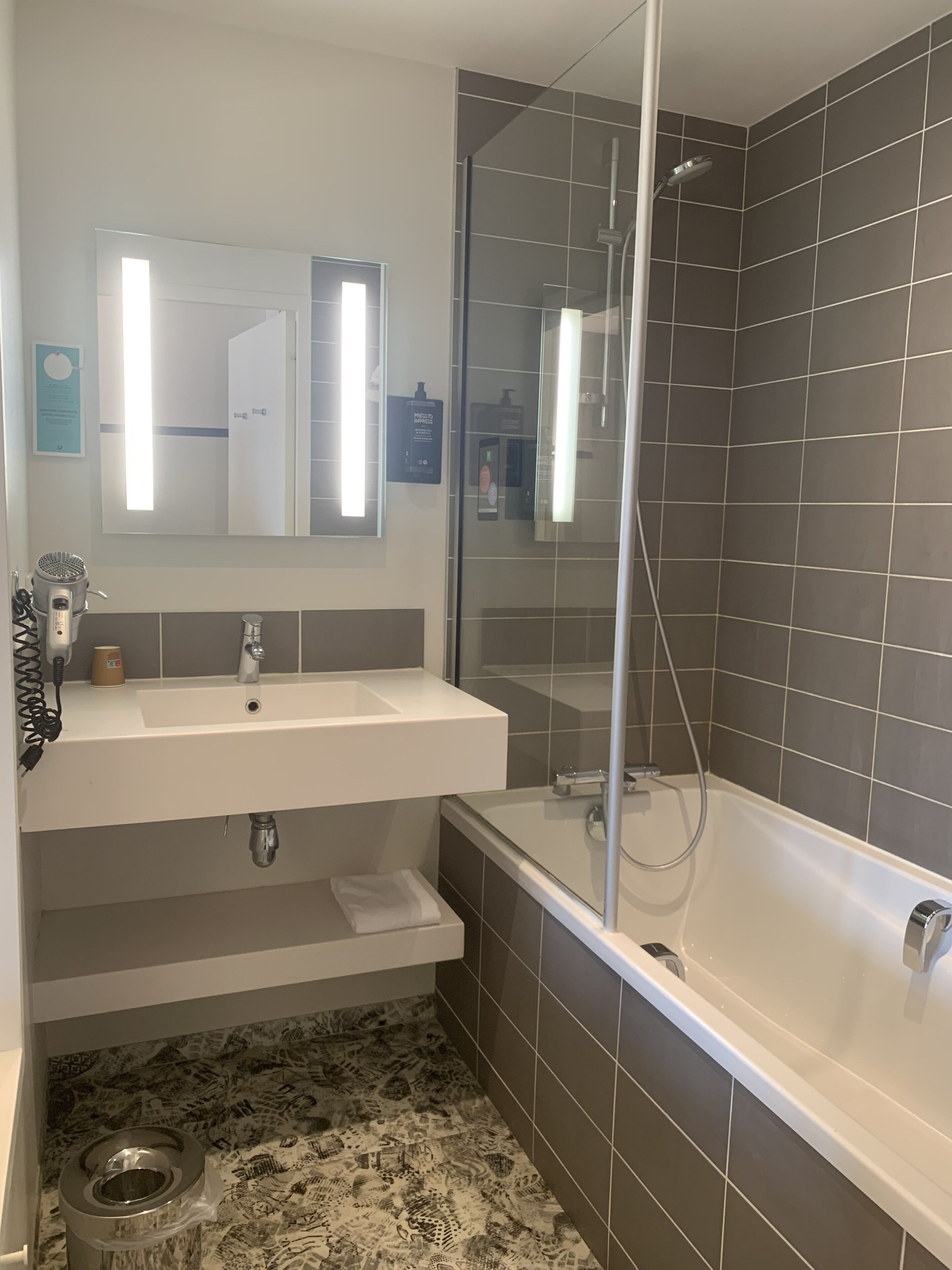 eco-friendly toiletries, hair dryer, towels