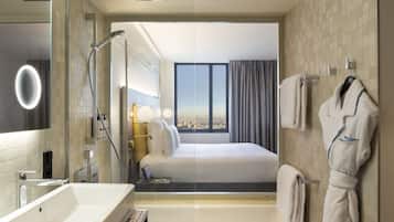 Deluxe Suite, 1 King Bed with Sofa bed (Paris View) | Bathroom | Eco-friendly toiletries, hair dryer, bathrobes, slippers