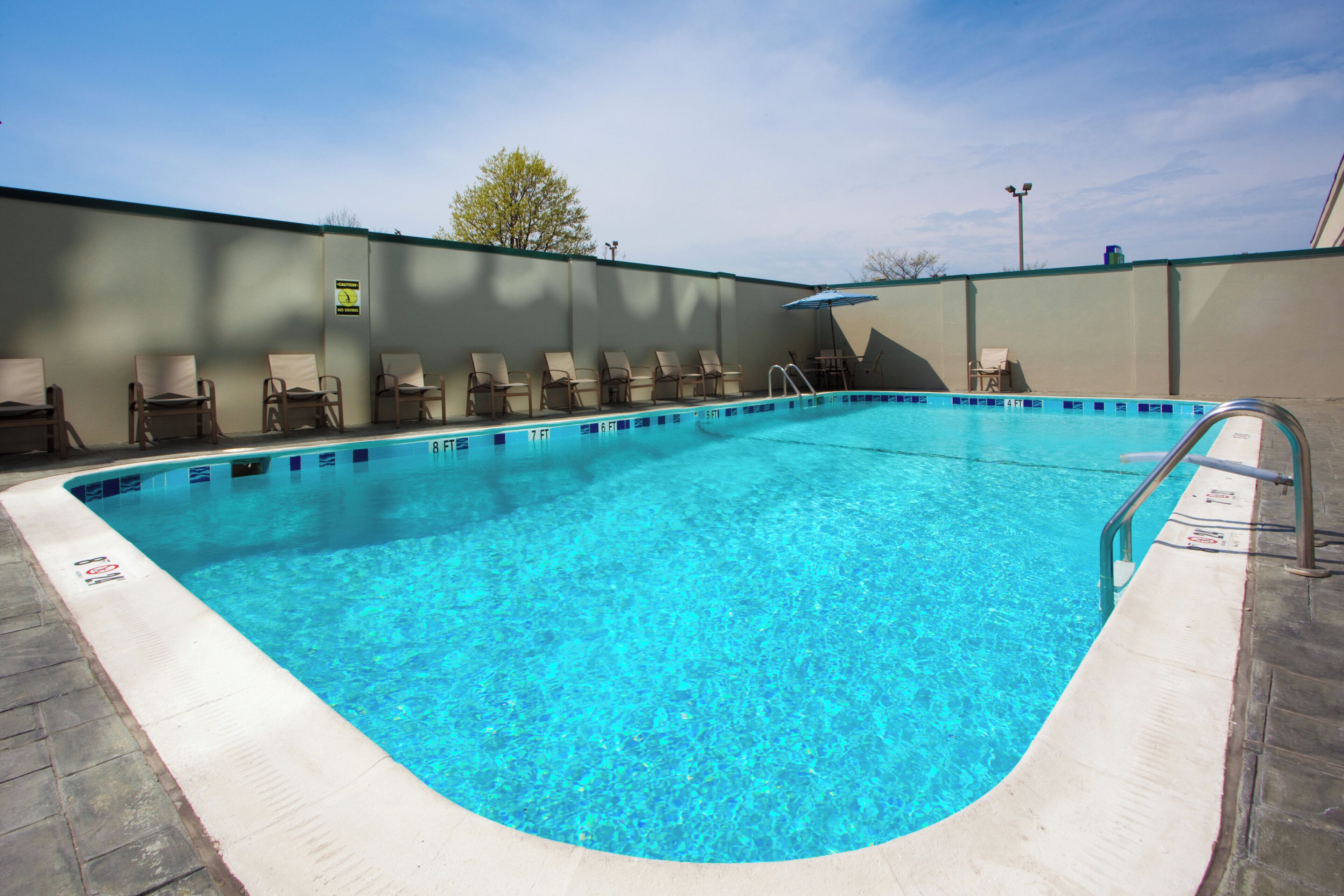 Outdoor pool, open 10:00 AM to 9:00 PM, sun loungers, lifeguards on site