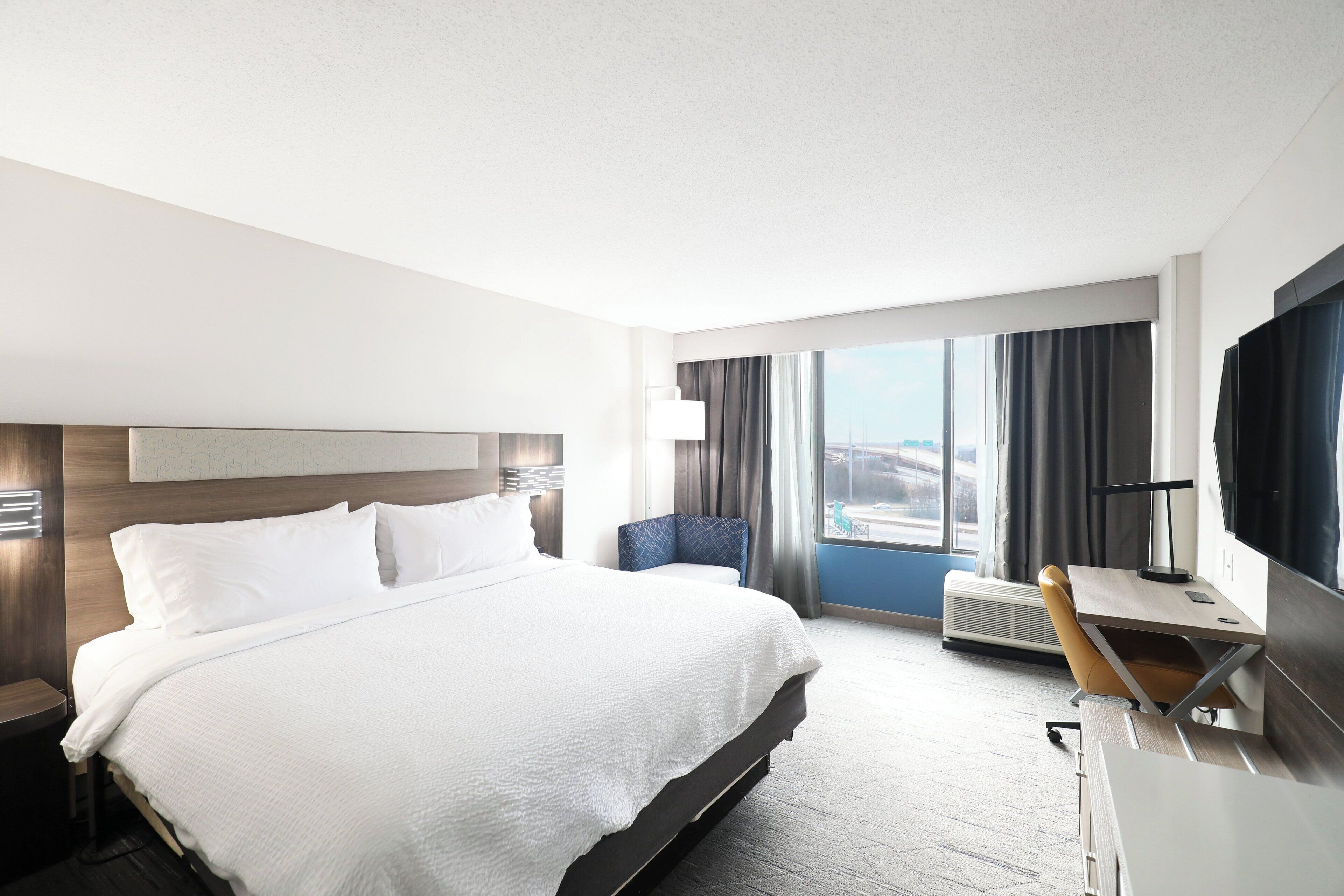 Desk, laptop workspace, blackout curtains, iron/ironing board