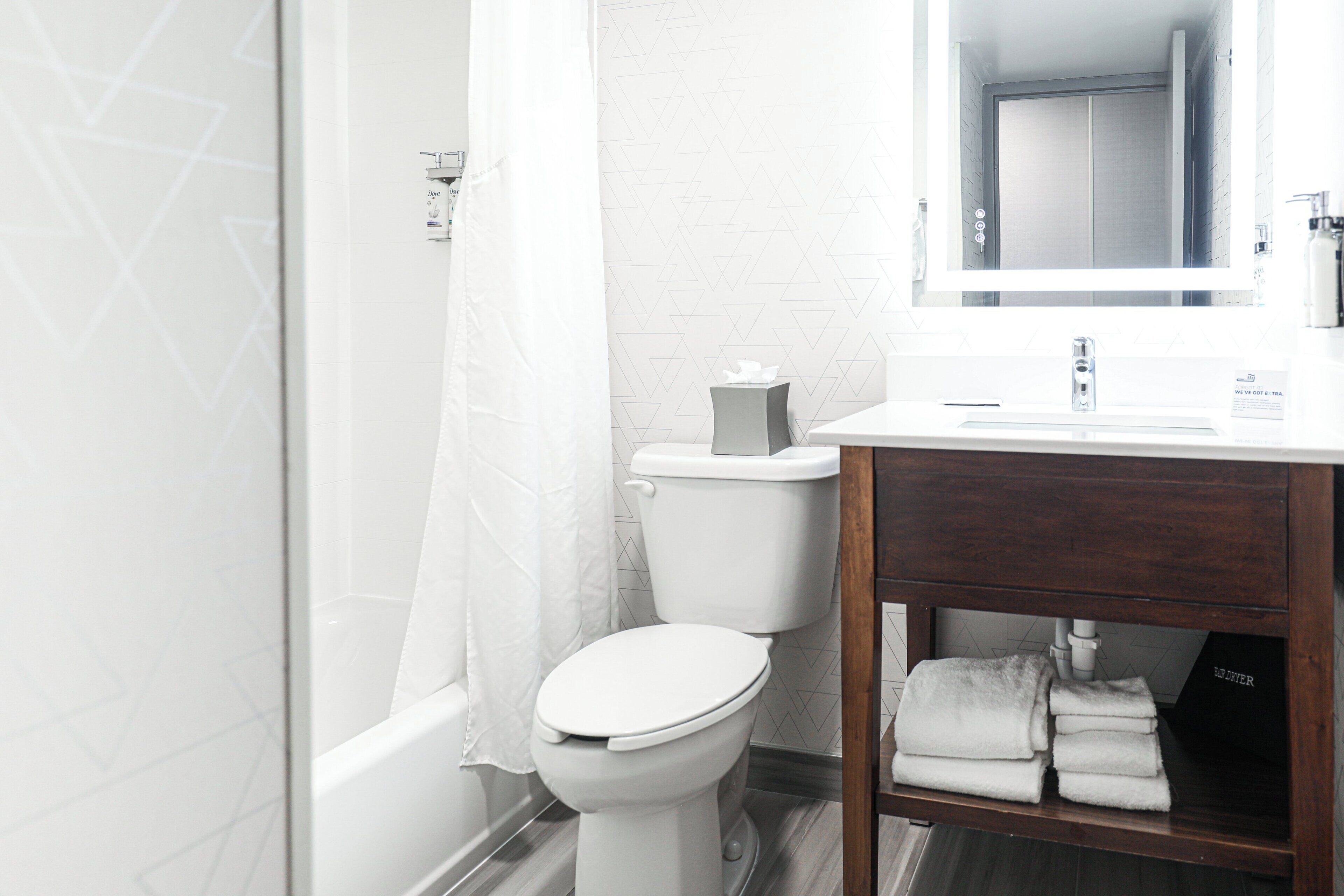 Desk, laptop workspace, blackout curtains, iron/ironing board