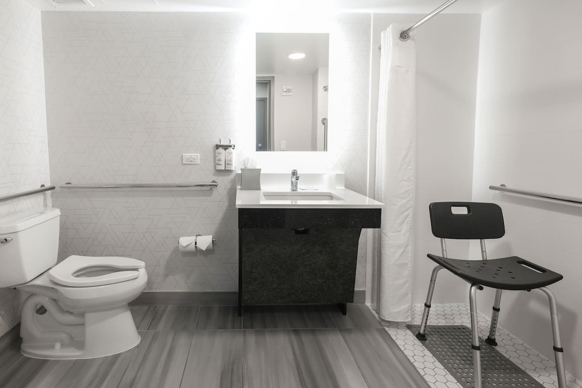 Desk, laptop workspace, blackout curtains, iron/ironing board