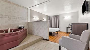 Chambre, 1 grand lit, baignoire Ă jets | Rideaux occultants, Wi-Fi gratuit, draps fournis