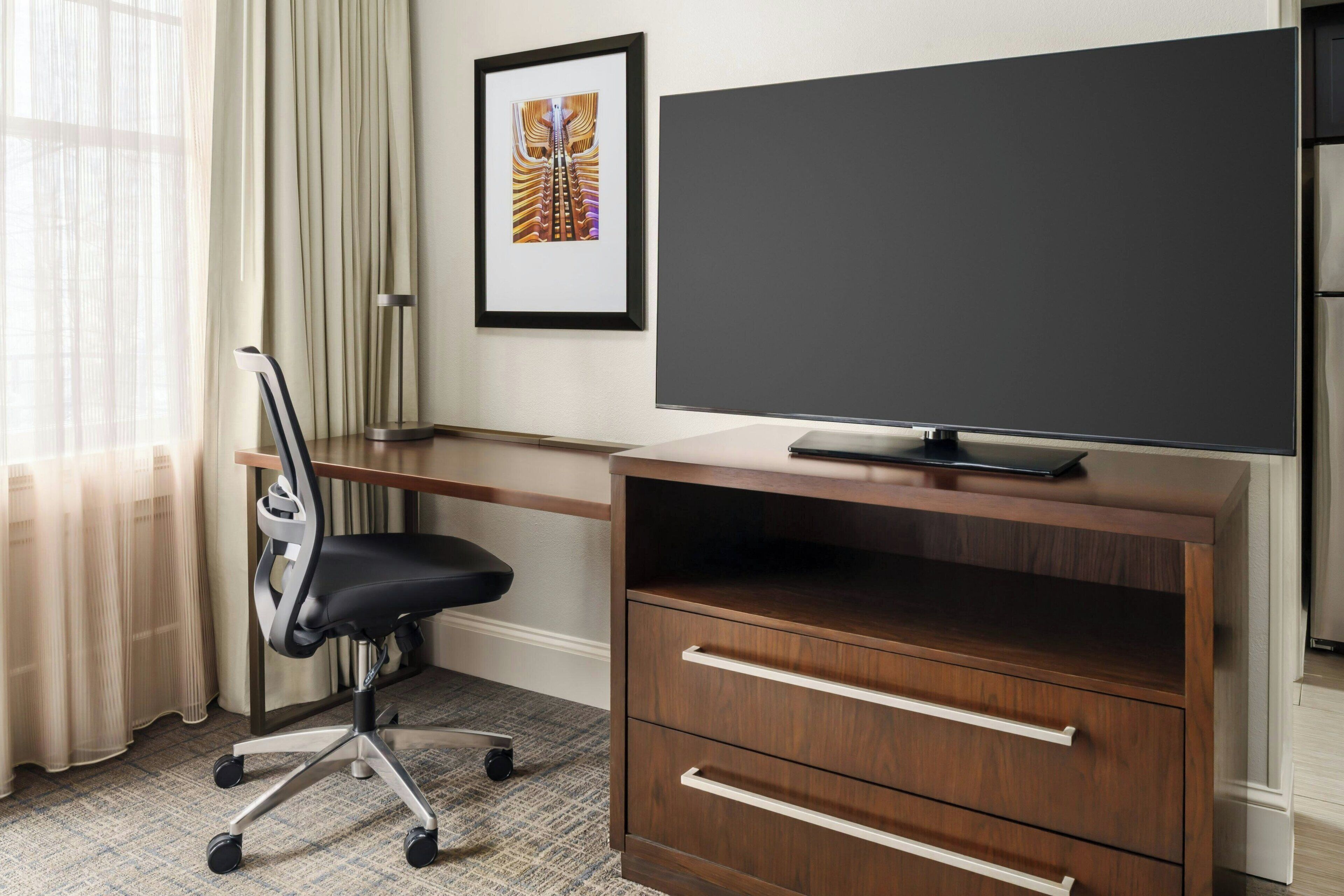 premium bedding, desk, blackout curtains, iron/ironing board