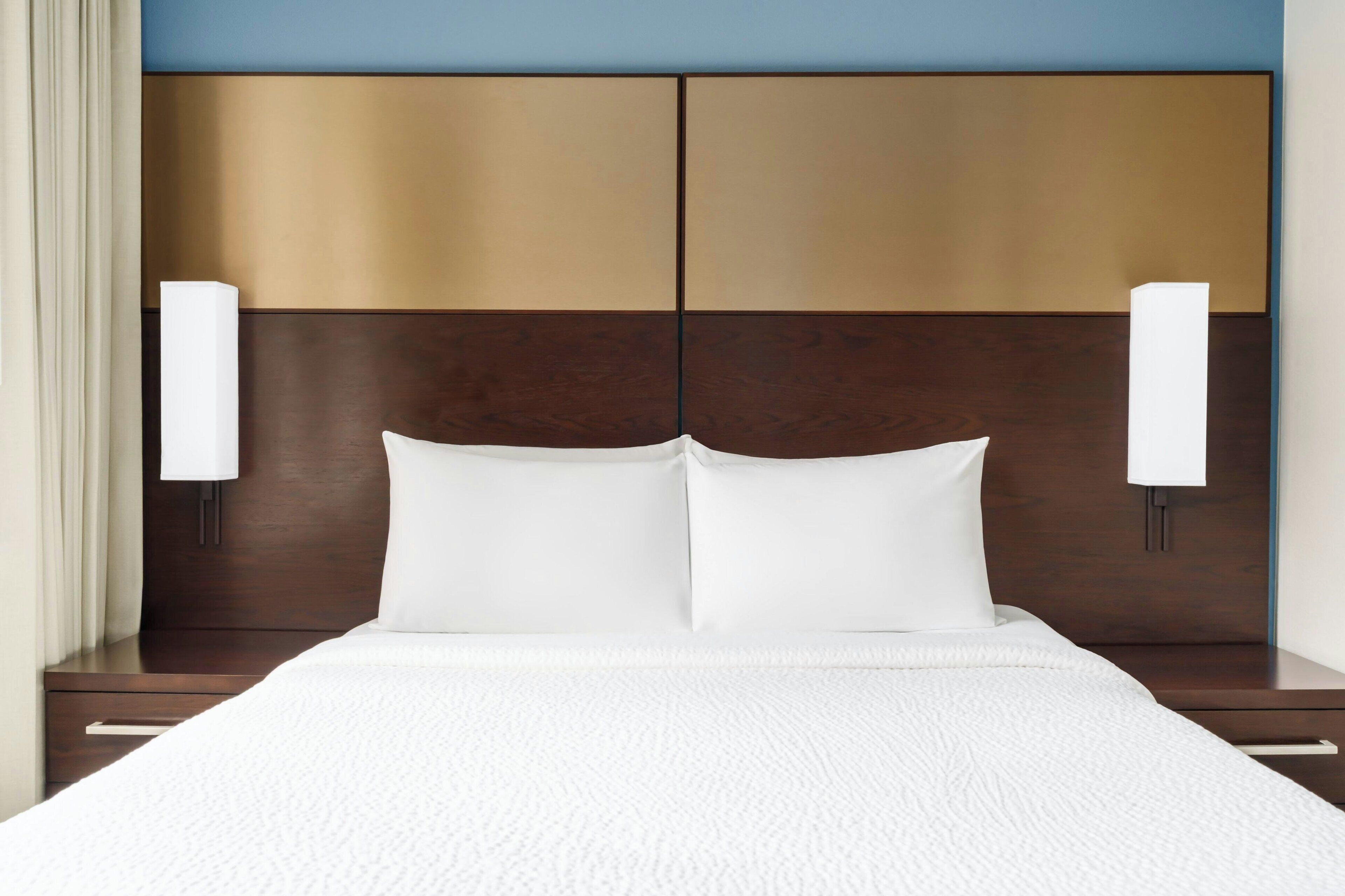 premium bedding, desk, blackout curtains, iron/ironing board