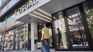 A modern building with a sign reading "The Usual." - The Usual Brussels (Brussels)