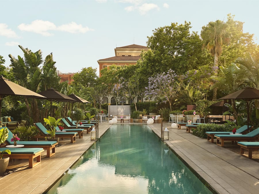 Seasonal outdoor pool, open 10:00 AM to 7:00 PM, sun loungers