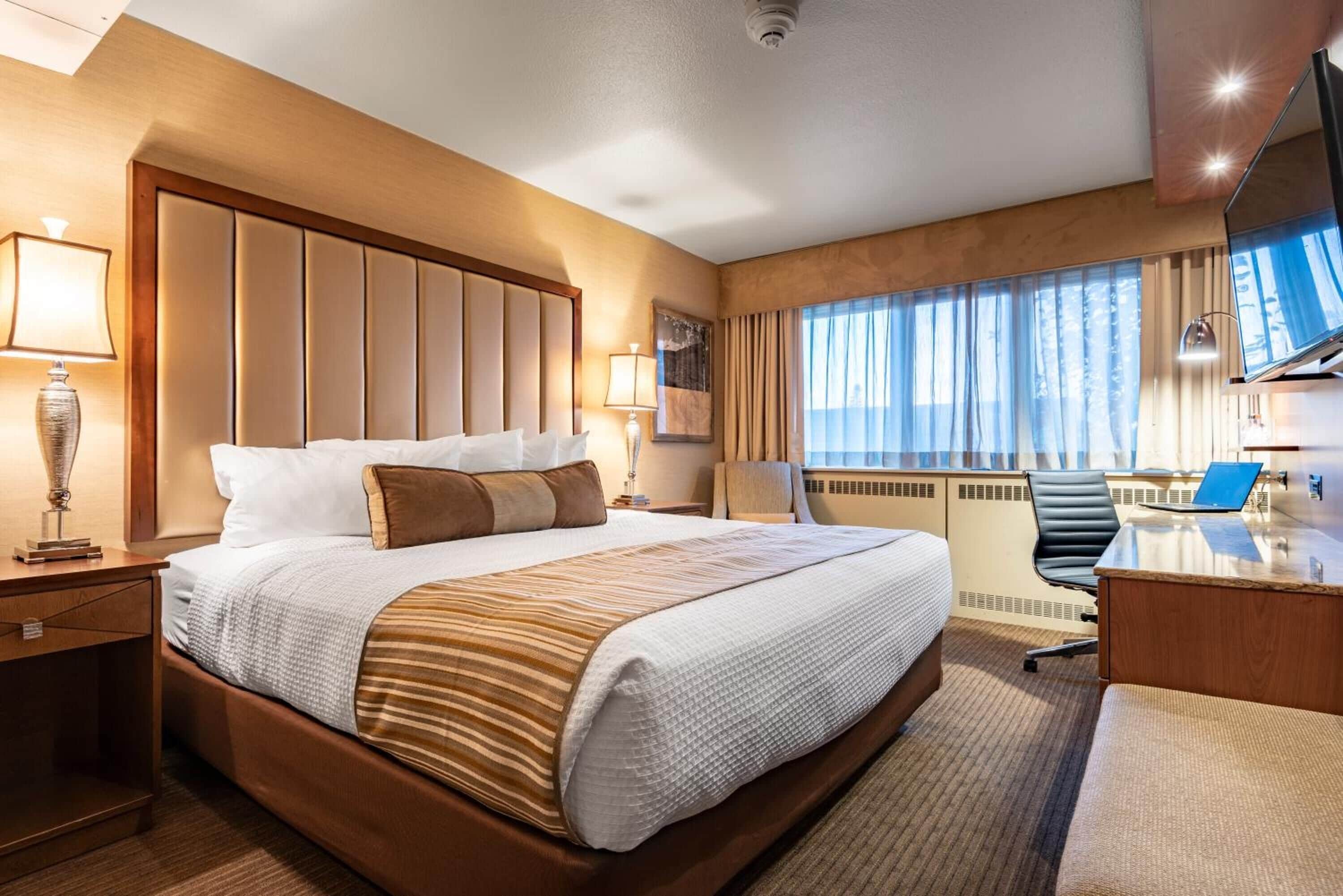 desk, laptop workspace, blackout curtains, iron/ironing board