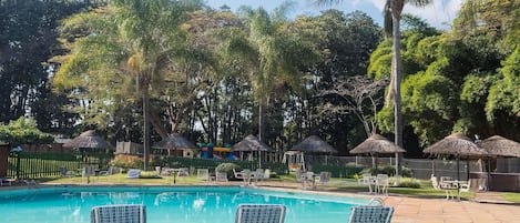 Outdoor pool, pool umbrellas, pool loungers