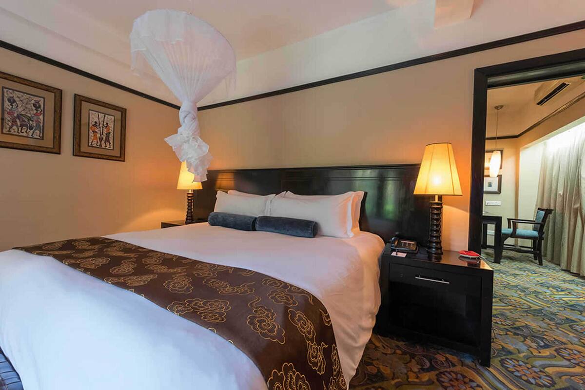 Phòng Suite | Chăn bông, minibar, két bảo mật tại phòng, bàn 
