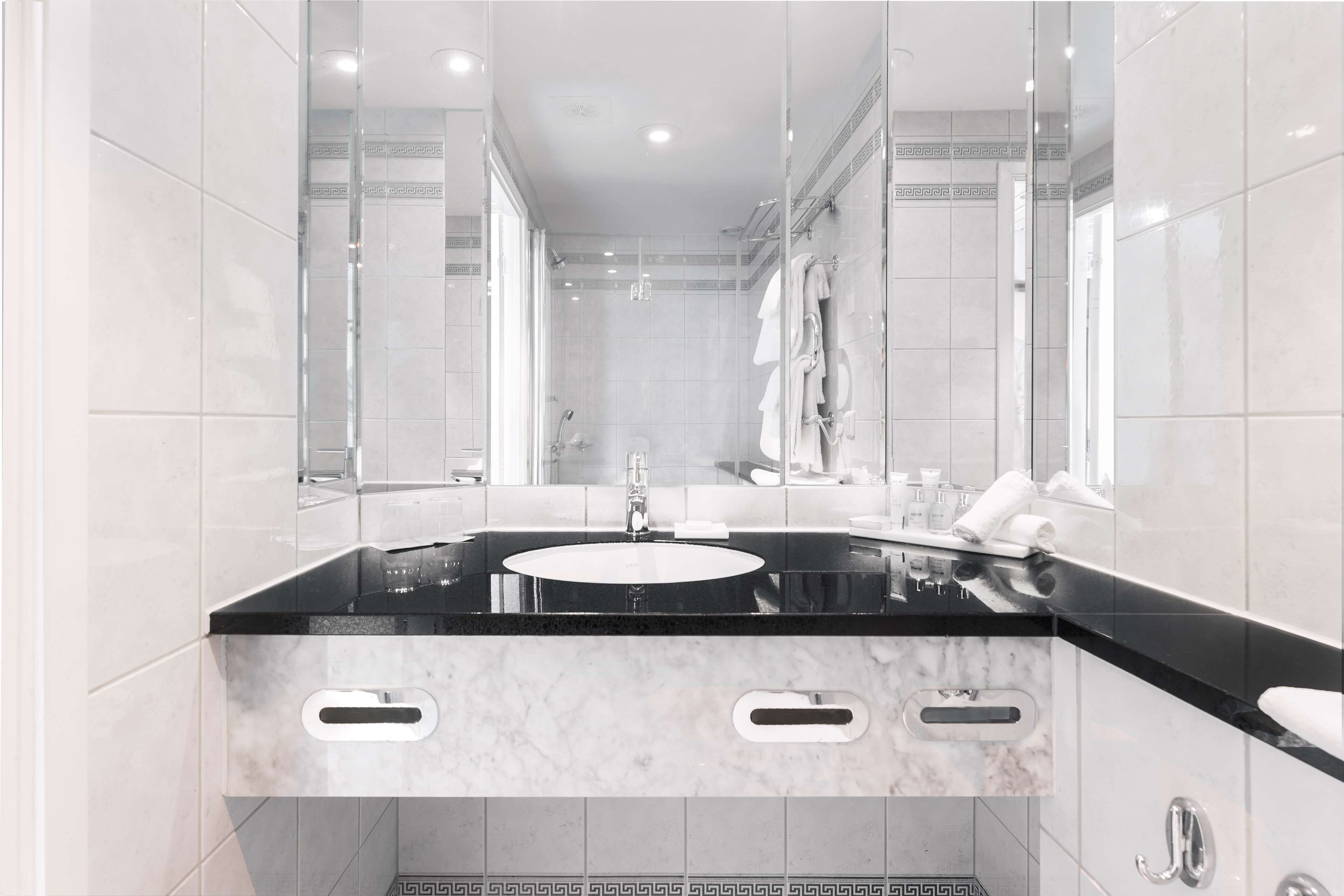 standard room | bathroom | rainfall showerhead, free toiletries, hair dryer, towels