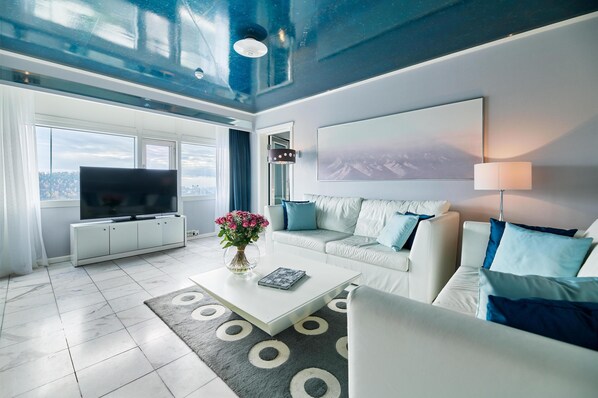 Flat-screen TV, pay movies