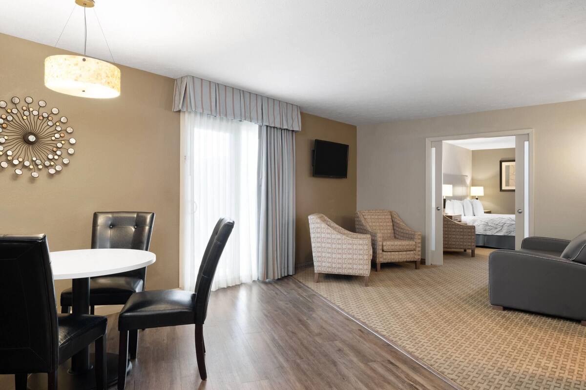 Luxury Suite, 1 Bedroom, Non Smoking | Premium bedding, desk, laptop workspace, iron/ironing board