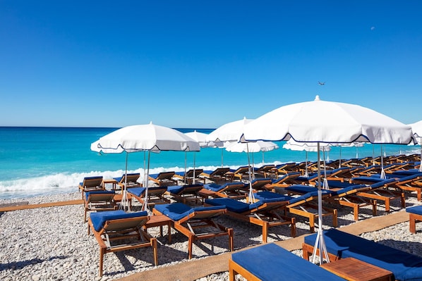 On the beach, beach towels, beach bar