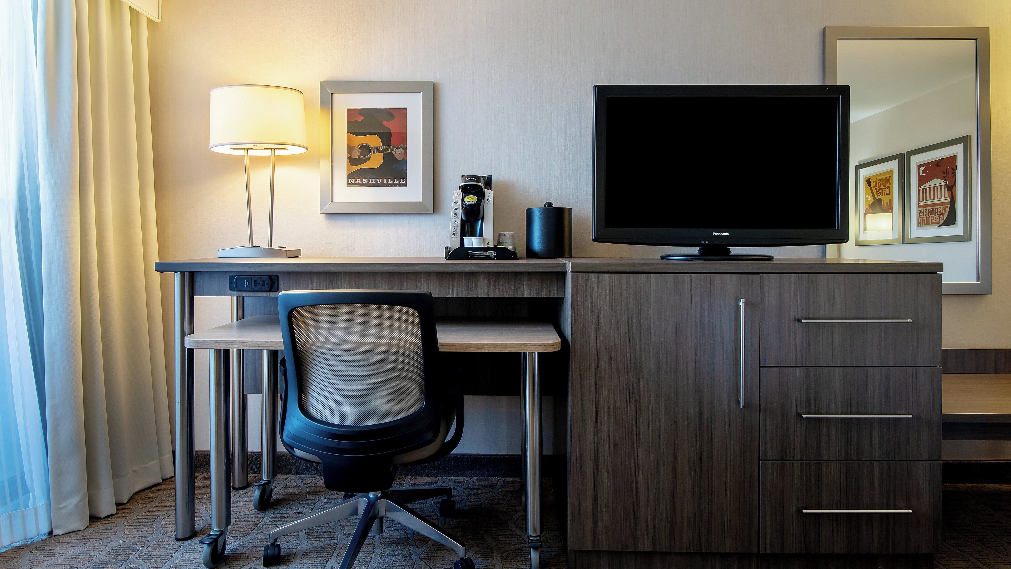 premium bedding, pillow-top beds, desk, laptop workspace