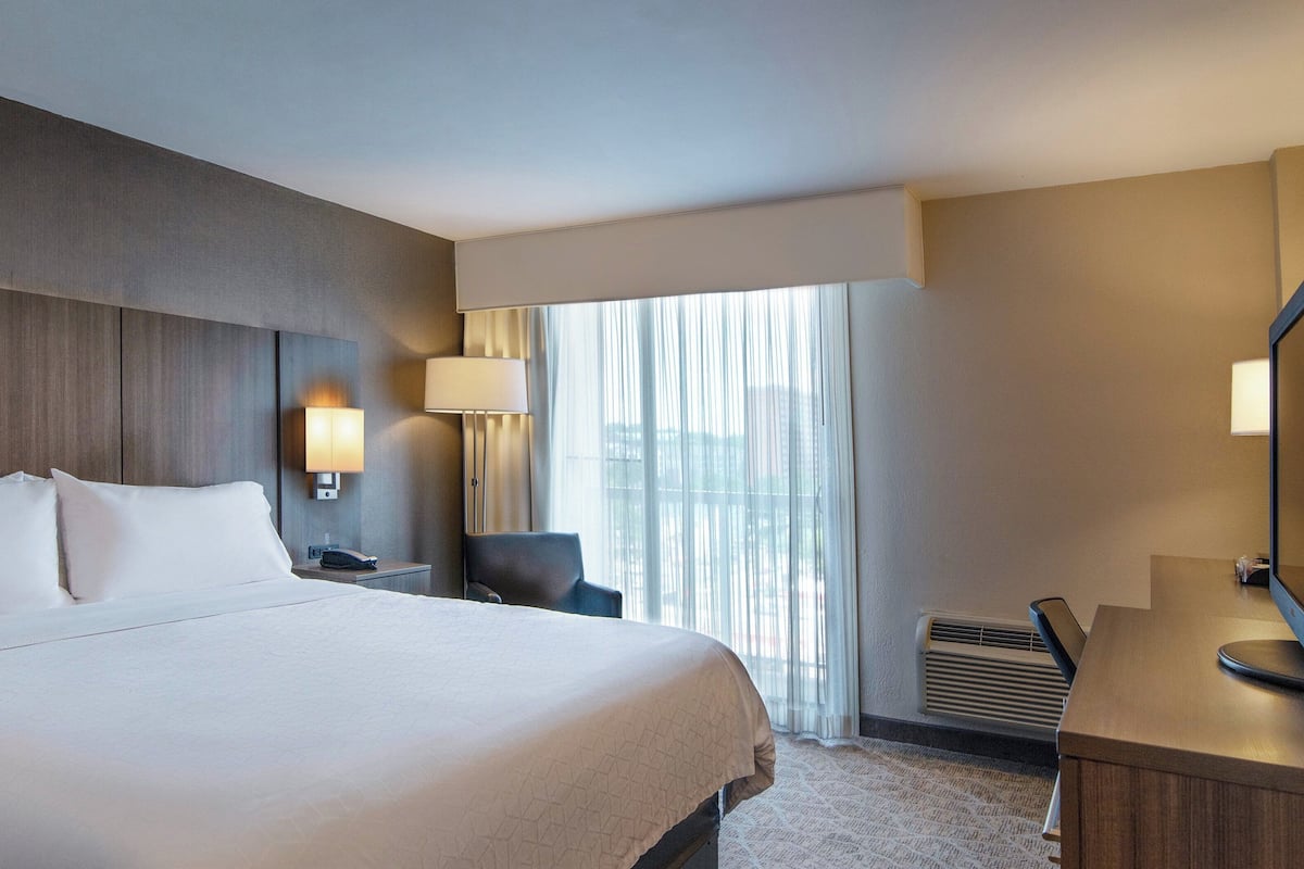 Premium bedding, pillow-top beds, desk, laptop workspace