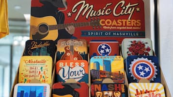 A display of Nashville-themed coasters with various designs.