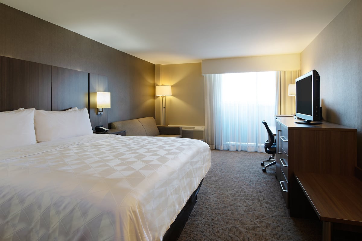 Premium bedding, pillow-top beds, desk, laptop workspace