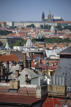 A cityscape with a prominent cathedral and surrounding buildings. - Best Western Hotel Moran (Prague)