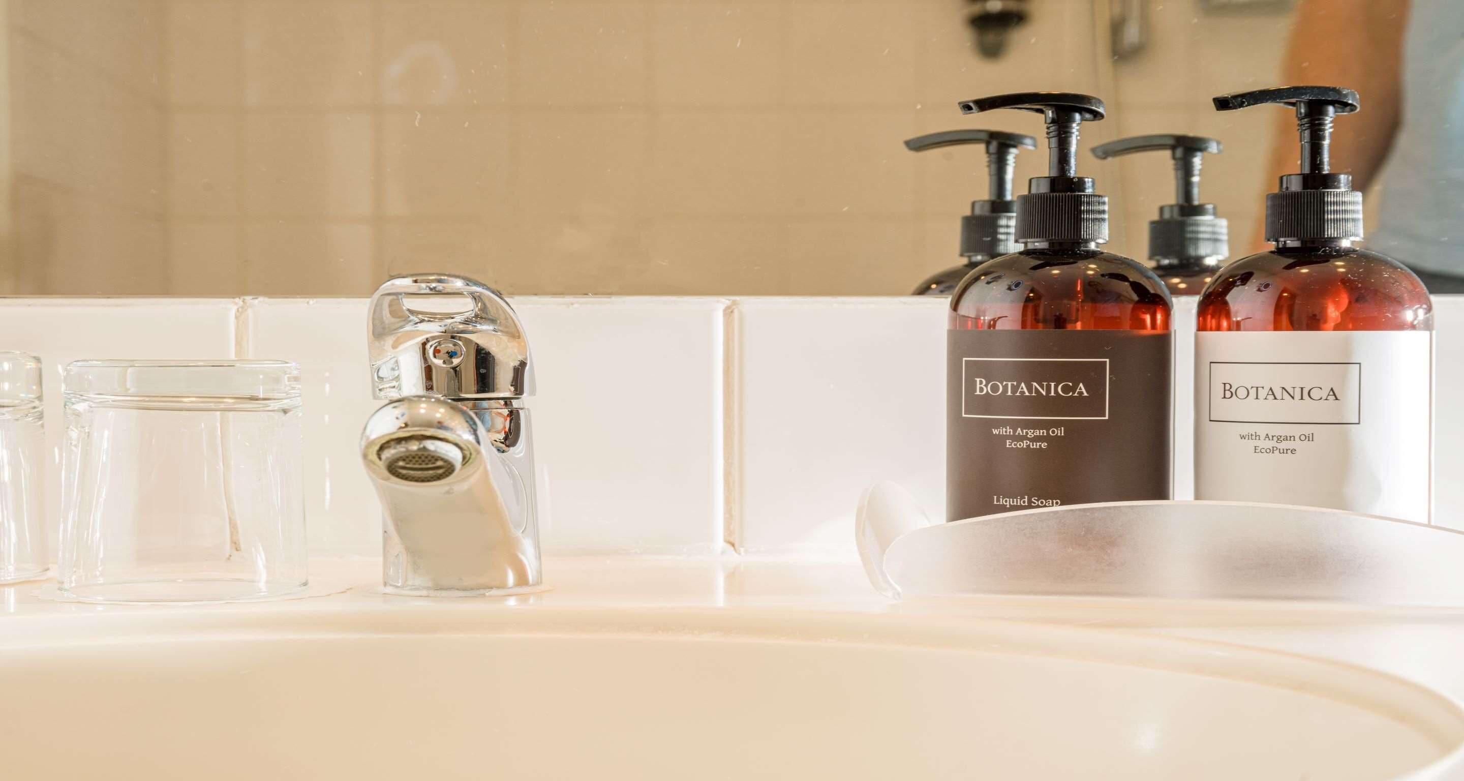 bathtub, hair dryer, towels