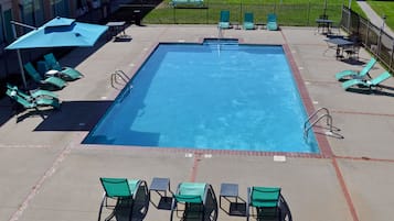 Seasonal outdoor pool, open 9:00 AM to 9:00 PM, pool umbrellas
