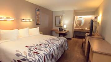 Caixa forta a l'habitació, escriptori i cortines opaques