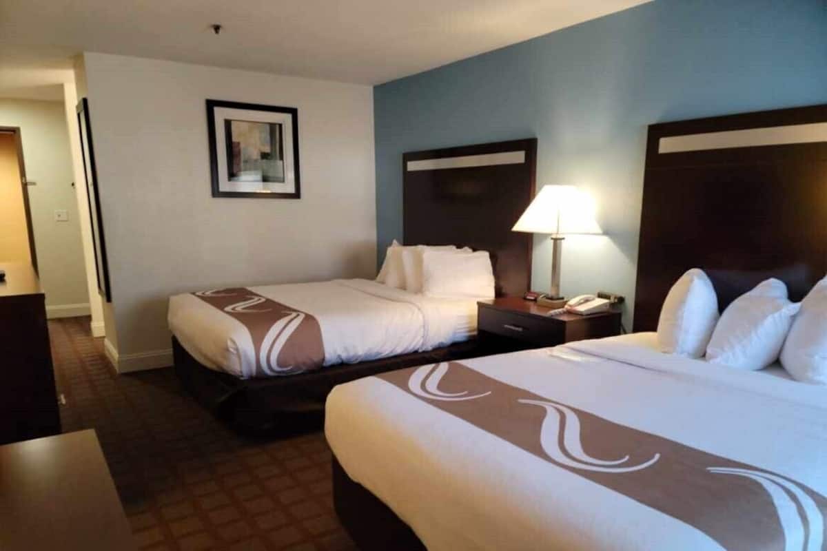 Premium bedding, pillowtop beds, blackout drapes, iron/ironing board