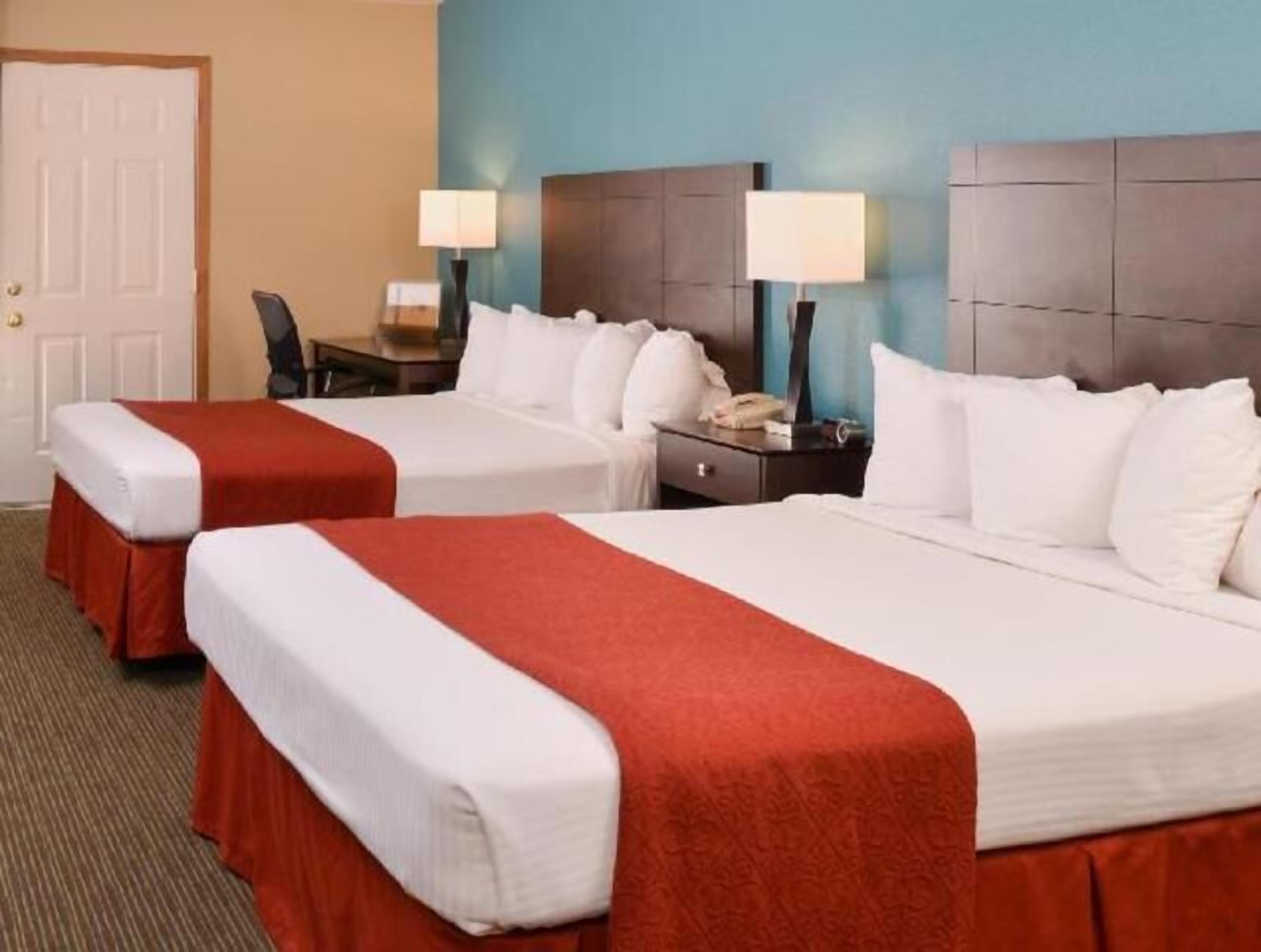 Blackout drapes, iron/ironing board, rollaway beds, free WiFi