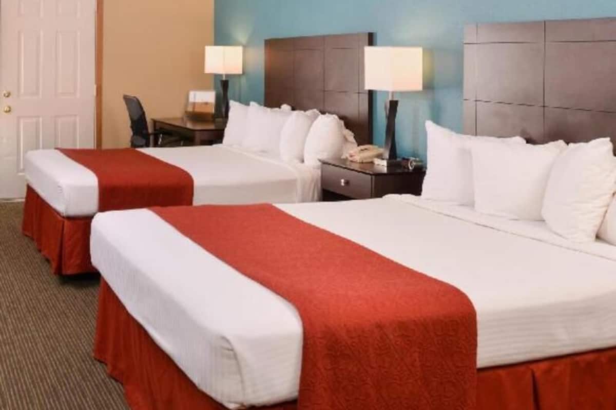 Blackout drapes, iron/ironing board, rollaway beds, free WiFi