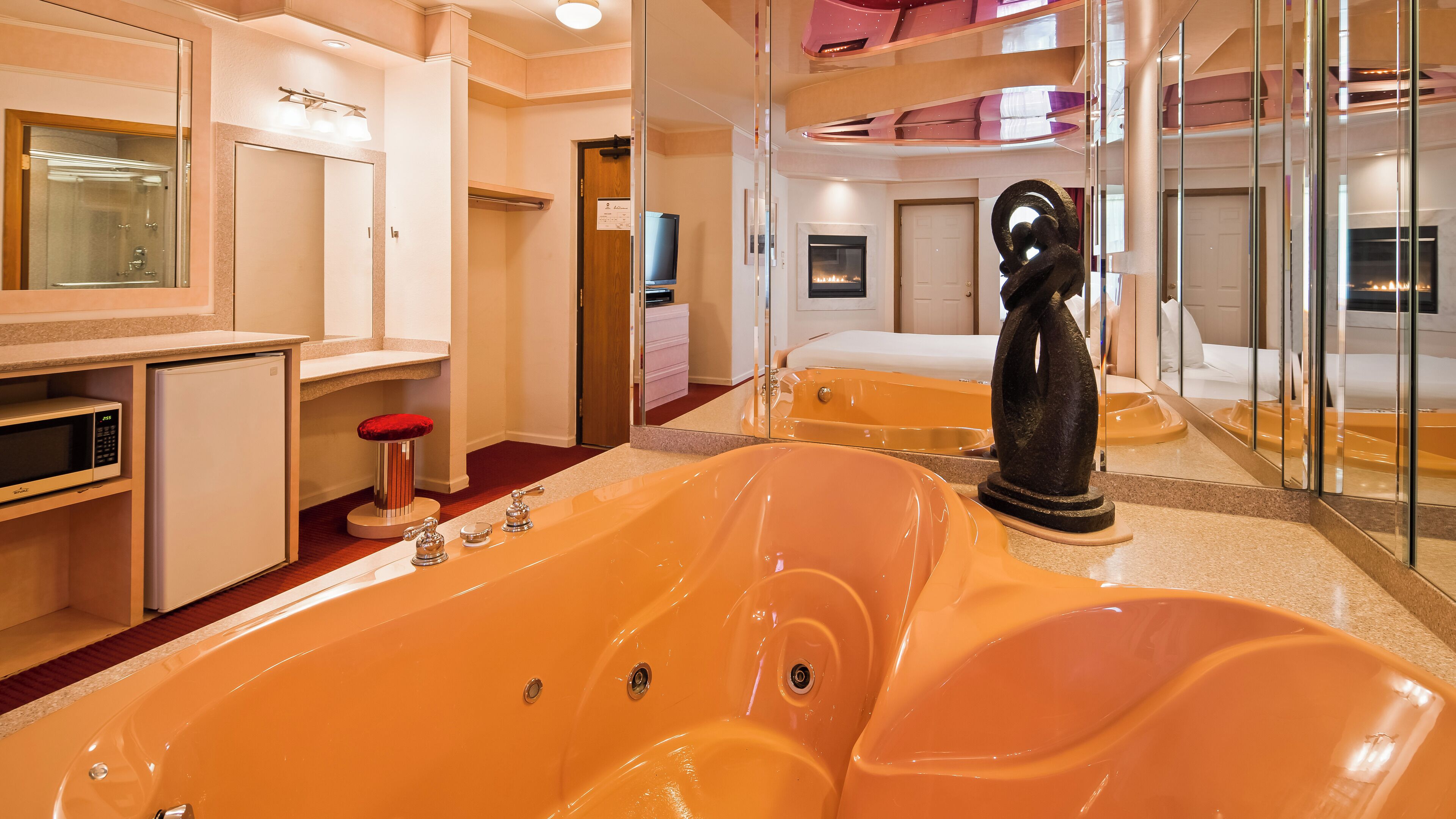 suite, 1 king bed, non smoking, jetted tub | blackout curtains, iron/ironing board, rollaway beds, free wifi