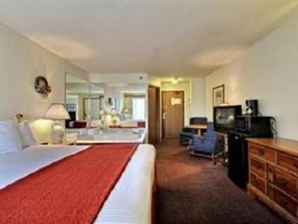 Blackout drapes, iron/ironing board, rollaway beds, free WiFi