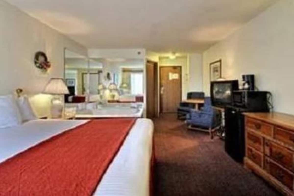 Blackout drapes, iron/ironing board, rollaway beds, free WiFi