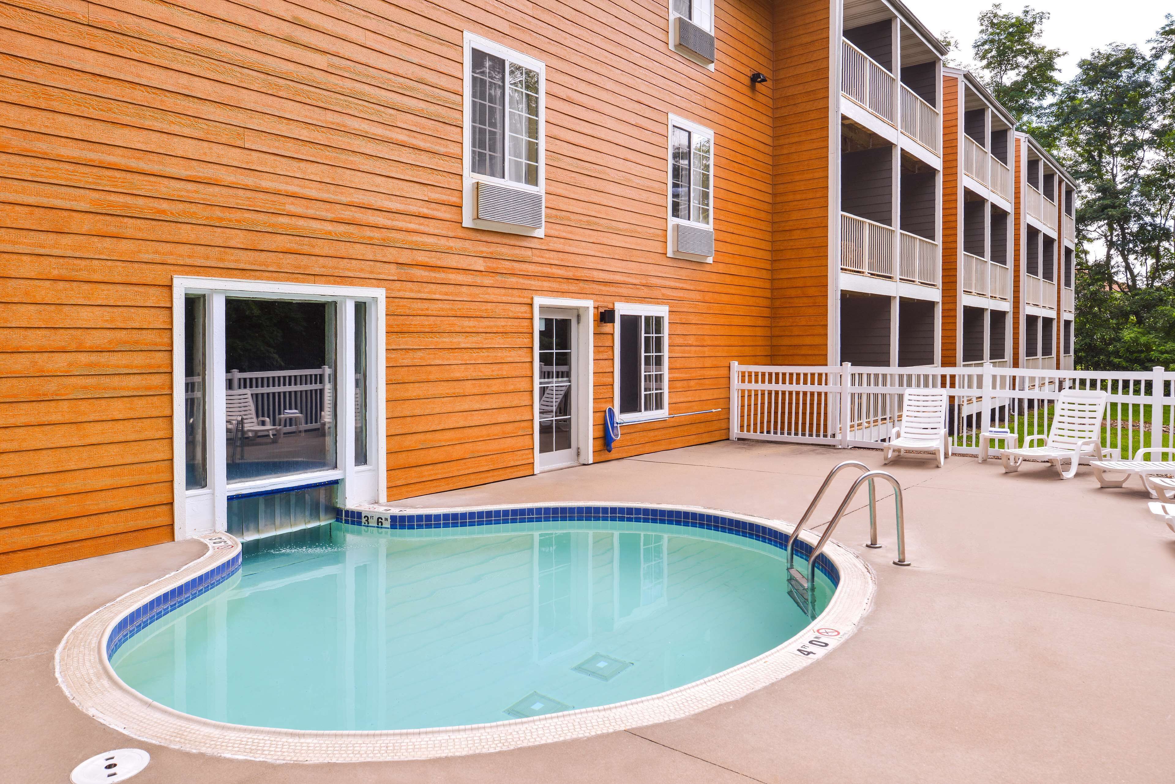 indoor pool, outdoor pool, pool loungers