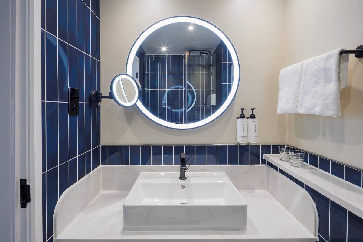 eco-friendly toiletries, hair dryer, bathrobes, towels